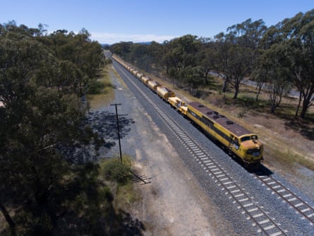 A freight train travels south on the main line south of Euroa, Victoria.